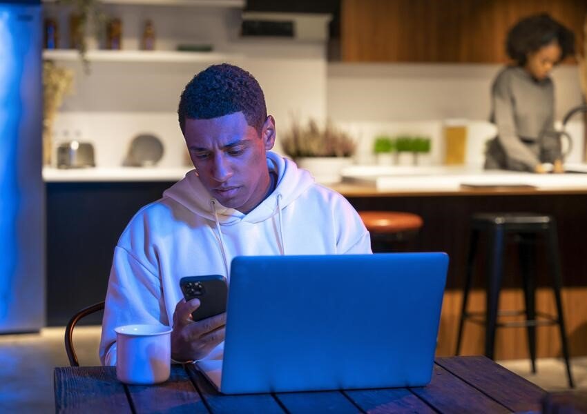 medium shot man with laptop 1